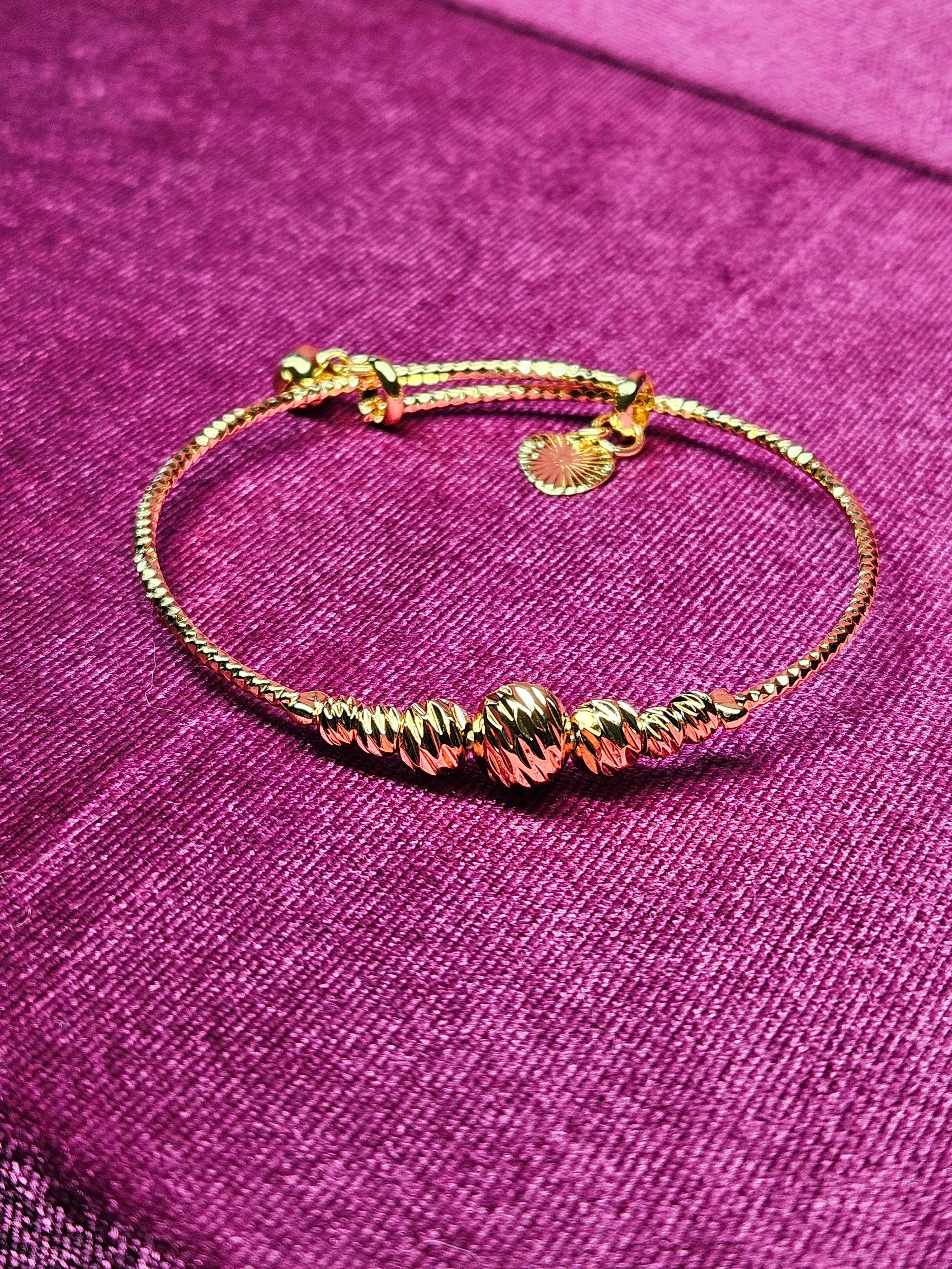 24K Gold Plated Adjustable Snake Chain Slider Bracelet | 7 Clustered Ribbed Beads with Charm Detail